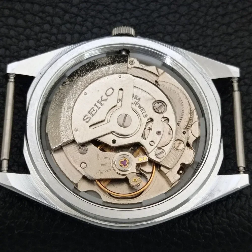 Vintage 1970 FCB Seiko Automatic Mens Silver Watch W/daydate & White accents